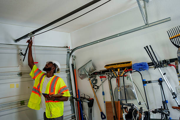 Professional Garage Door Roller Replacement technician working in Chemung County County, NY